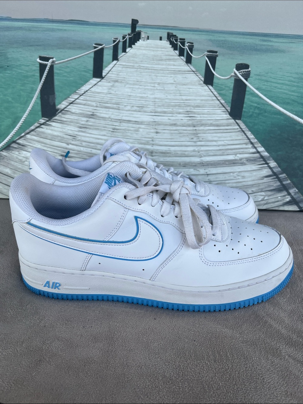 Nike Air Force 1 White Low-Top Sneakers with light Blue Accents